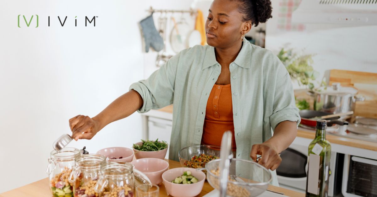 Woman meal planning healthy meals with fresh ingredients to achieve nutrition and wellness healthy goals.
