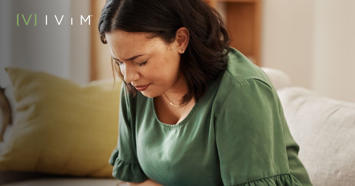 Illustration of a person experiencing GLP-1 nausea as a side effect of GLP-1 medication